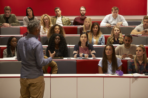 Back,View,Of,Man,Presenting,To,Students,At,A,Lecture School Drug Tests
